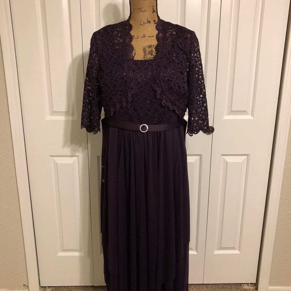 Belted dress and lace jacket